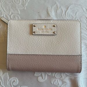 Gently used Kate Spade medium two tone wallet.